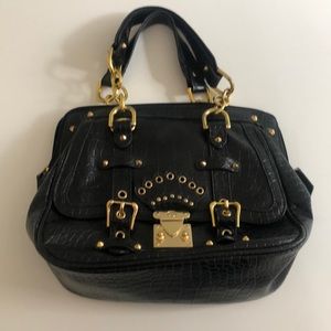 black with gold hardware handbag